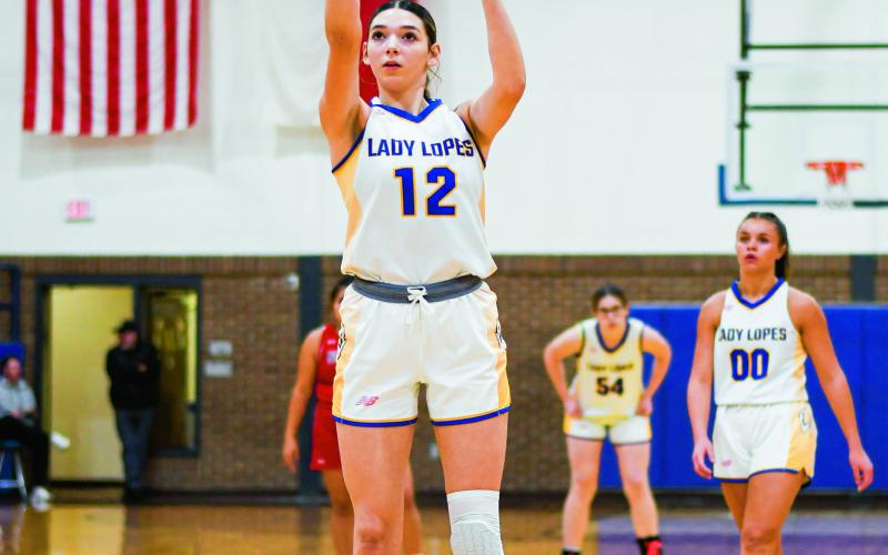 SOLIZ SHOOTS TWO - Whiteface Lady Lopes senior post Abi Soliz shoots two free throws during their game against Silverton earlier this month. Soliz is currently dealing with injuries but is expected to make her return soon. (Staff photo by Jentezen Smith)