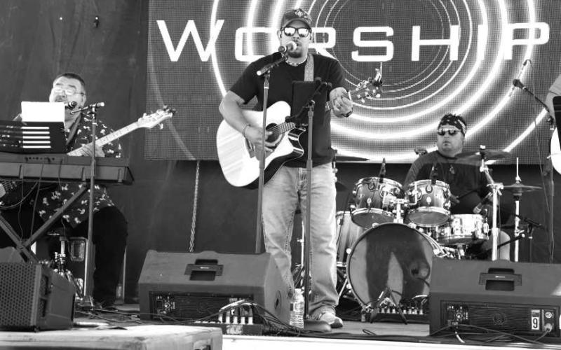 JAMAICA CONCERT - One of the many bands that participated in the St. Michael’s Catholic Church Jamaica Annual Event on Sunday was Worship 4. Many community members attended the concert while also enjoying the many vendors and activities. (Photo courtesy of Emily Campos)
