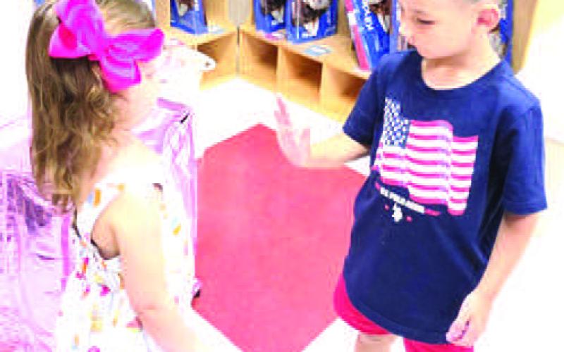 HELLO FRIEND - Two students are seen greeting each at Levelland ABC back to school night. Levelland ISD students and staff will start the new school year Wednesday, Aug. 19. (Levelland ISD)