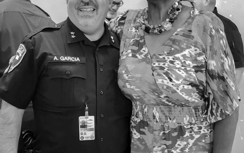 GREAT APPRECIATION - Levelland Police Department Communication Supervisor Margaret Golightly retired from her position after a 30-year career with the department. Pictured together are LPD Chief Albert Garcia and Golightly. After stepping away from the LPD, Golightly hopes the department won’t hesitate to call on her if her services are required. (Staff Photo by Dom Puente)