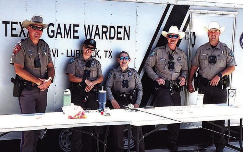 FISHING EVENT – Pictured are game wardens who came to Casting with Cops on Saturday. The event was a fun way to get to know local law enforcement while fishing at Lobo Lake. (Staff photo)