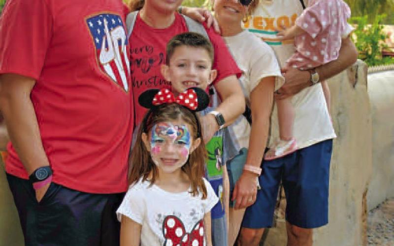 TIME FOR FAMILY - Following her 40-year career teaching and coaching, Nelda Munoz stated she is ready to focus on her family and spend more time with her children and grandchildren. Munoz thanked her family for the support she has received from them during her teaching and coaching career. Pictured is Munoz’s family: Michael Sparks, daughter Susan Sparks, Quin Sparks, Beckham Sparks, Ashley Connell-Munoz, son Matt Munoz and Lottie Munoz. (Photo courtesy of Nelda Munoz)