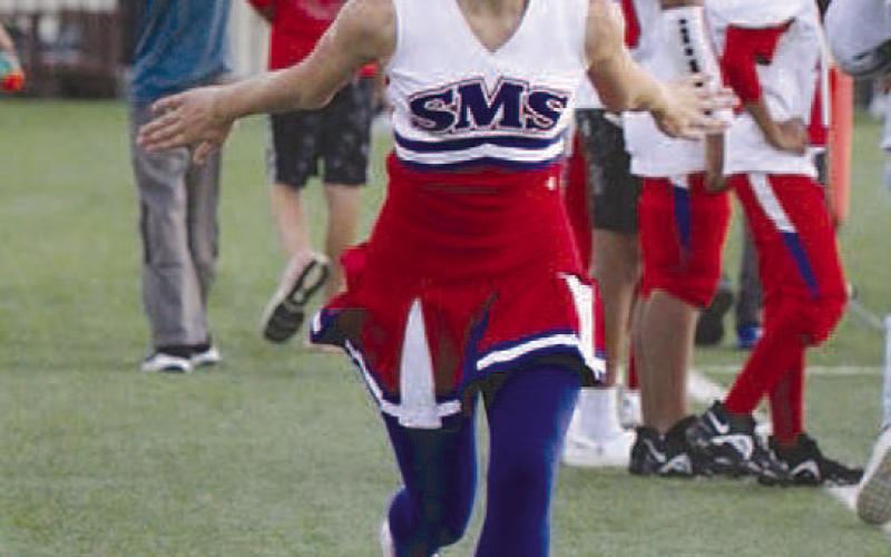 TUMBLINGCHEERLEADER- Sundown seventh grade cheerleader, Riley Scifres prepared for a tumbling pass during the seventh grade football games held at Post on Thursday, October 20th. She went end over end with great ease, and has done so all season. (Photo Courtesy of Sundown ISD)