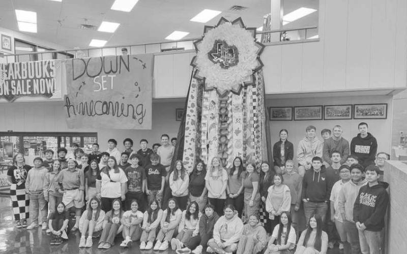 GIANT MUM-- LHS students in Ms. Tori Henderson's Floral Design &amp;amp; Horticulture classes thought outside the box and made a gigantic mum for Homecoming this year. This was a fun way for students to show school spirit and celebrate Homecoming. Pictred are Ms. Tori Henderson’s Floral Arrangement Class &amp;amp; Horticulture Class. (Photo courtesy of Levelland ISD)