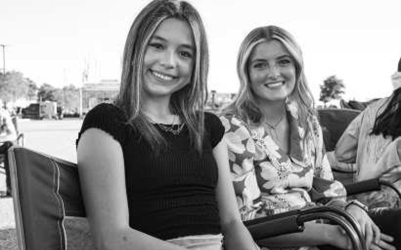 BEST NIGHT EVER - Krystal Bunker and Charley King were having a blast at the Cotton and Crude Festival on Saturday at the Oxy Sports Complex. (Staff photo by Hannah Woodrum)