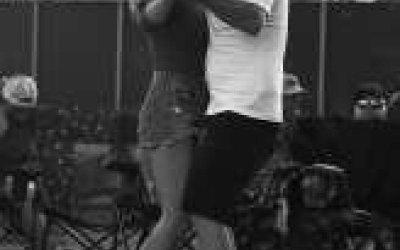 DANCINGTHENIGHTAWAY - This couple was seen smiling and dancing the night away at the Cotton and Crude Festival on Saturday at the Oxy Sport Complex. The festival included performances by William Banaster and Randall King. (Staff photo by Hannah Woodrum)