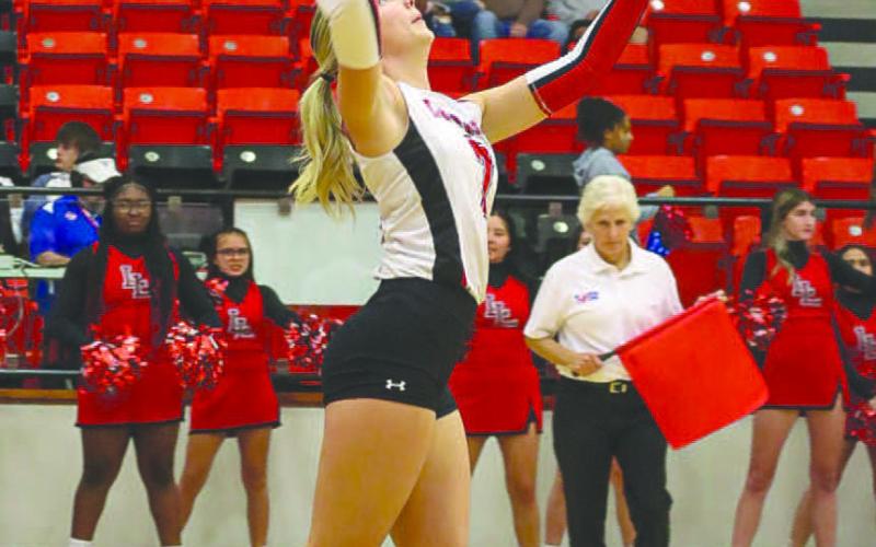SERVICE LINE - Levelland Loboette Addisen Campbell served the ball against the Lady Steers this past Monday in Colorado City during the team’s playoff game. (Staff photo by Aalijah Soliz)