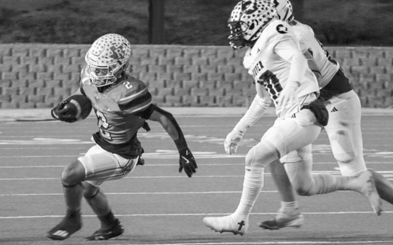TOO FAST - Ropes Eagle Mason Marmolejo turned the corner on the Gruver Greyhounds during the team’s last game of the season in Canyon. (Staff photo by Aalijah Soliz)