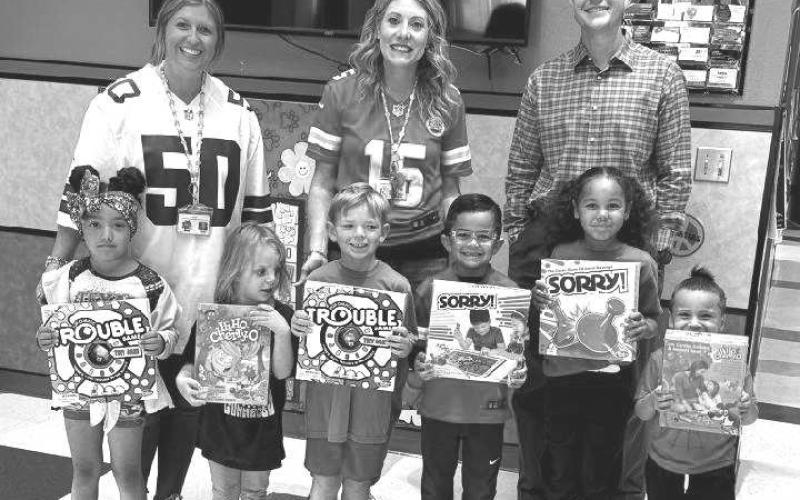 WINNERS - ABC Principal Ashley Howard and Assistant Principal Ginger Hicks shared the first nine weeks perfect attendance winners on Friday. Landon McCormack and City Bank sponsored the program. Pictured are student winners from left to right: Brooklyn Almanza, Hazel Elmore, Kayson Massey, Luke Lopez, Harmoney Collins and Elijah Matamoros. (Photo submitted by Cristal Isaacks)