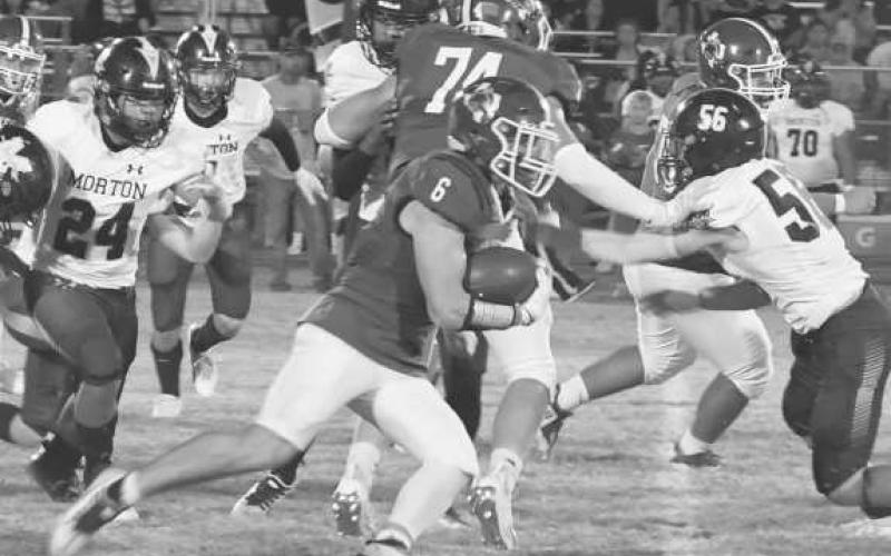 OPEN SPACE - Smyer’s Preston Moore was the go-to runner for the Bobcats in a 29-6 loss to the visiting Morton Indians last Friday. Smyer will be in Seagraves next while Morton will travel to New Home. Both games will be on Friday at 7 p.m. (Photo by Jay Kelley)