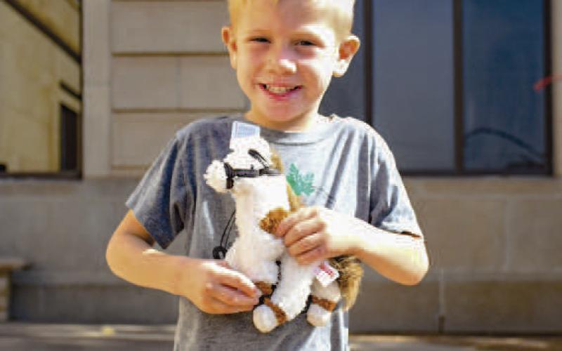 WINNER WINNER – Pictured is Hudson Patterson who won a miniature horse at the Hockley County Memorial Library event, Minis and Friends on Wednesday. The library gave away miniature horses provided by Minis and Friends to the children. (Photo by Hannah Woodrum)