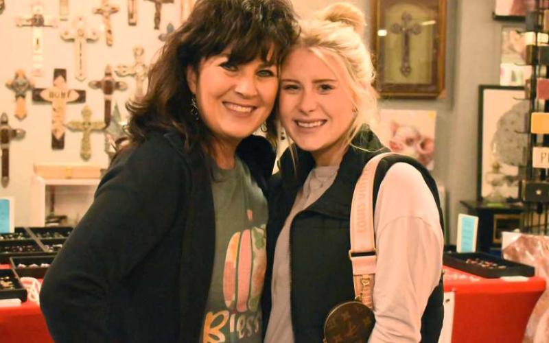 T&amp;amp;S GIRLS NIGHT OUT - Michelle and Alyssa Wells enjoyed a little quality mother and daughter time together during the Ladies Night Out event Thursday in downtown Levelland. Several stores in the downtown area opened their doors for the evening holding specials, drinks and prizes for those in attendance. (Photo courtesy of Delany Jackson)