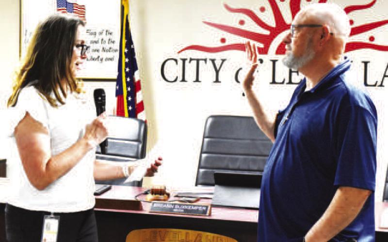 CITY COUNCIL BOBBY MORRIS-- Levelland City Council Bobby Morris, representing District A, was sworn in by City Secretary Andrea Corley on Monday. (Staff photo)