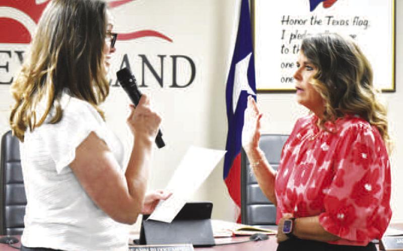 CITY COUNCIL ANGIE YANDELL-- Levelland City Council member Angie Yandell, representing District C, was sworn in by City Secretary Andrea Corley on Monday. (Staff photo)