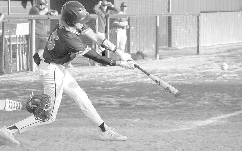 MOVING RUNNERS- Levelland had everything working at home last Friday with a 11-1victory over Big Spring. Lobo Wyatt Baccus put the ball in play and moved the runners. The Lobos will host Estacado Tuesday. (Staff Photo by Dom Puente)