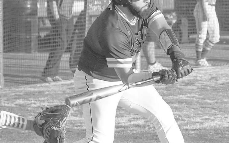CHECK SWING- Levelland had everything working at home last Friday with a 11-1victory over Big Spring. Lobo Marco Guillen checked his swing on a low pitch. The Lobos will host Estacado Tuesday. (Staff Photo by Dom Puente)