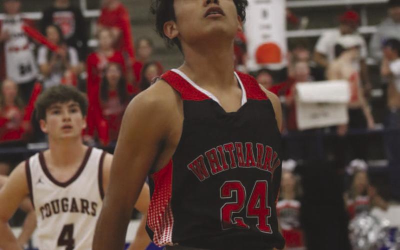 AND ITS UP - Whitharral Panther Nomar Gomez watched his shot go down into the basket during the team’s game against Klondike this past Tuesday at Frenship High School. (Staff photo by Aalijah Soliz)