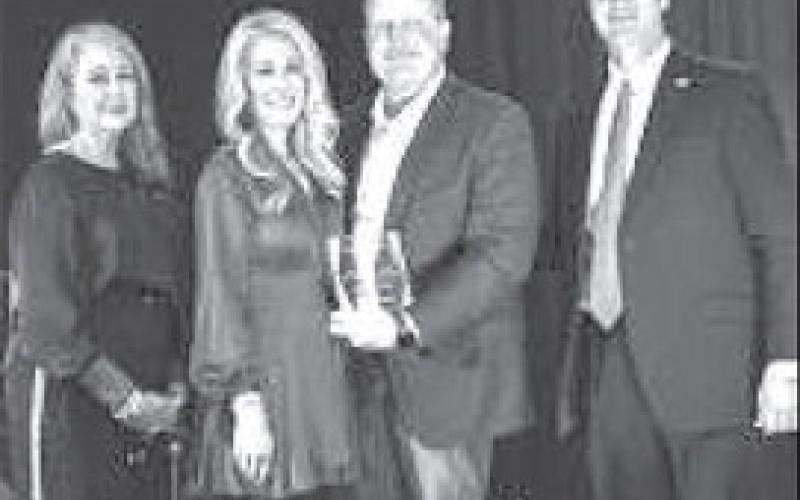 SPC FOUNDATION -Board President Ann Capps and SPC President Dr. Robin Satterwhite presented the 2024 Pacesetter Award to Scott and Jaime Bryant at the college’s 26th Annual Scholarship Gala on Feb. 23 at the Mallet Event Center in Levelland. Pictured from left are: Ann Capps, Jaime Bryant, Scott Bryant and Robin Satterwhite.(Photo courtesy of SPC)