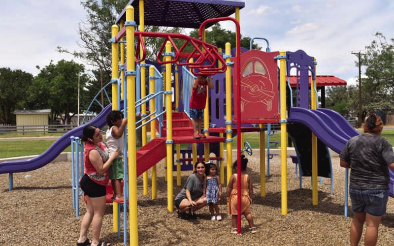 LET’S PLAY - Residents are pictured playing at Bartlett Park this past week. After the much-needed rain, temperatures were just right for residents to enjoy local parks. (Staff photo by C.R. Calhoun)