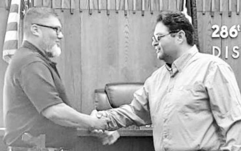 COCHRAN COUNTY’S NEWEST DEPUTY - Pictured is Kevin Lucio (right) being officially sworn-in as a deputy by Cochran County Sheriff Jody Guerra (left). A Cochran County native, Lucio has served as a jailer for the Cochran County Sheriff's Office for the past five years. Deputy Lucio recently completed the SPAG Regional Law Enforcement Academy. Lucio is the newest deputy to join the Cochran County Sheriff’s Office. (Photo courtesy of Jody Guerra)