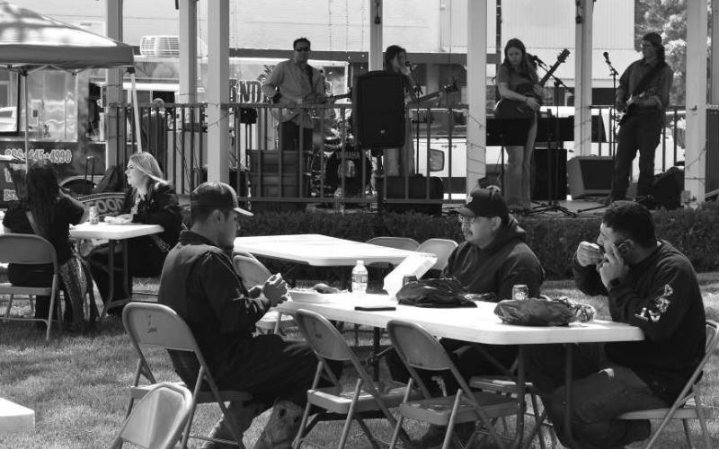 LUNCH ON THE SQUARE - Community members were encouraged to get a bite to eat during lunch time during the Levelland Main Street and the Food and Food Truck Day which is every third Thursday of each month. Tables, chairs and live music were provided during Thursday’s event with food trucks available from 11 p.m. to 2 p.m. (Staff Photo by Samantha Nowell)