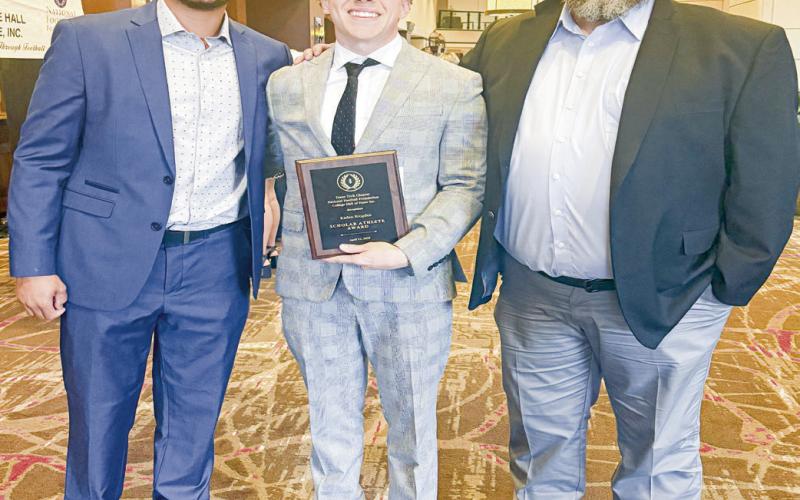 MEMORIAL SCHOLARSHIP - Levelland’s Kaden Brogden received the Doyle &amp;amp; Shirley Parker Memorial Scholarship, celebrating his excellence on and off the field as a leader and high-character student athlete. Kaden was chosen by the National Football Foundation &amp;amp; College Hall of Fame from a competitive group of 22 area honorees. Pictured to his left is Lyle Leong, his coach, and to his right Mike Brogden, his father. (Photo provided by Levelland ISD)