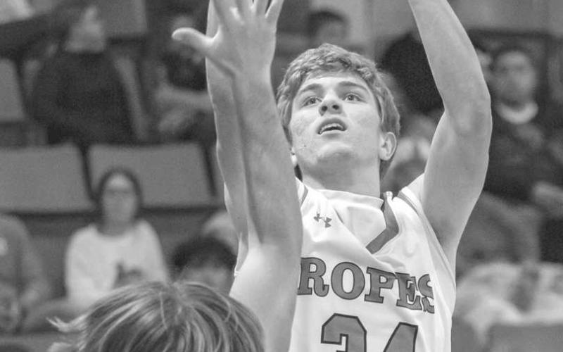 RISE UP - Ropes Eagle Landon Nale rose up against the defense to shoot the ball over the defender in the teams win in the Anton Tournament. (Photo courtesy of Donovan Martin)