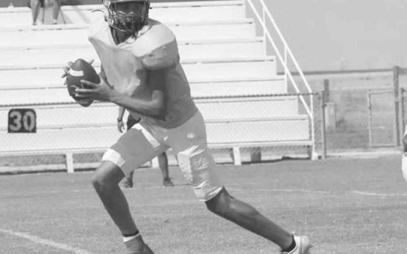ROLL OUT - Whiteface Antelope Isaak Soliz rolled out of the pocket this past Friday on the road against the Nazareth Swifts for the team’s last scrimmage before the season. (Photo courtesy of Holly Crutcher)