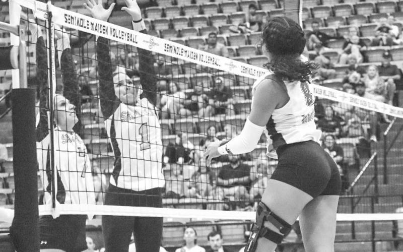 VERTICAL - Levelland Loboette Mia Sepulbeda rose above the net to spike the ball against the Seminole Maidens this past Tuesday on the road. (Staff photo by Aalijah Soliz)