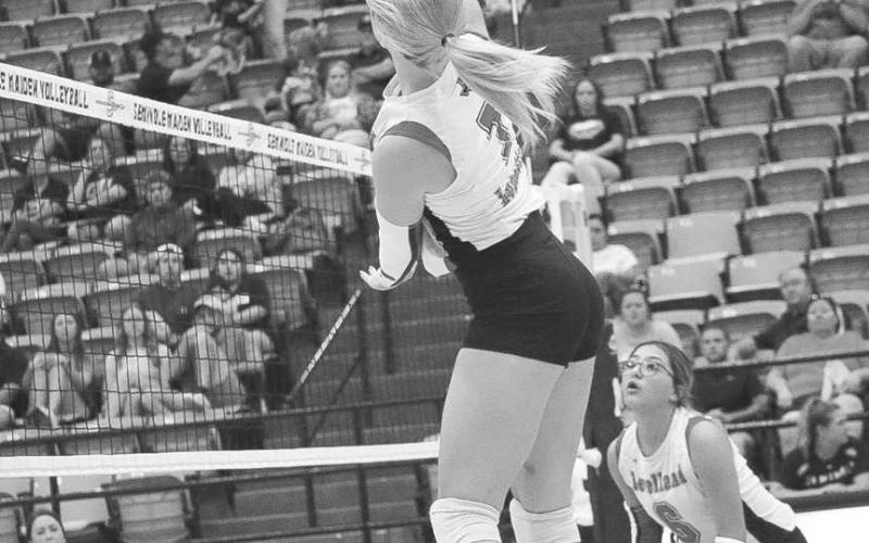 SPIKED - Levelland Loboette Addisen Campbell spiked the ball at the Maiden defense this past Tuesday in the team’s contest on the road. (Staff photo by Aalijah Soliz)