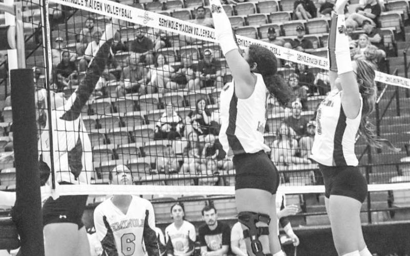 BLOCK PARTY - Levelland Loboettes Hailiee Estrada and Mia Sepulbeda both jumped to block the Seminole Maidens spike this past Tuesday on the road. (Staff photo by Aalijah Soliz)