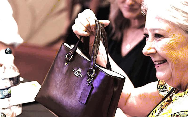 DESIGNER BAG BINGO - Participants enjoyed an evening of bingo to raise more than $45,000 SPC. (SPC photo)