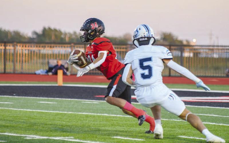 FAST ENOUGH - Levelland running back Ricky Rodriguez ran the ball well, and found some open field during the teams loss to the West Plains Wolves last Friday night. (Staff photo by Dom Puente)
