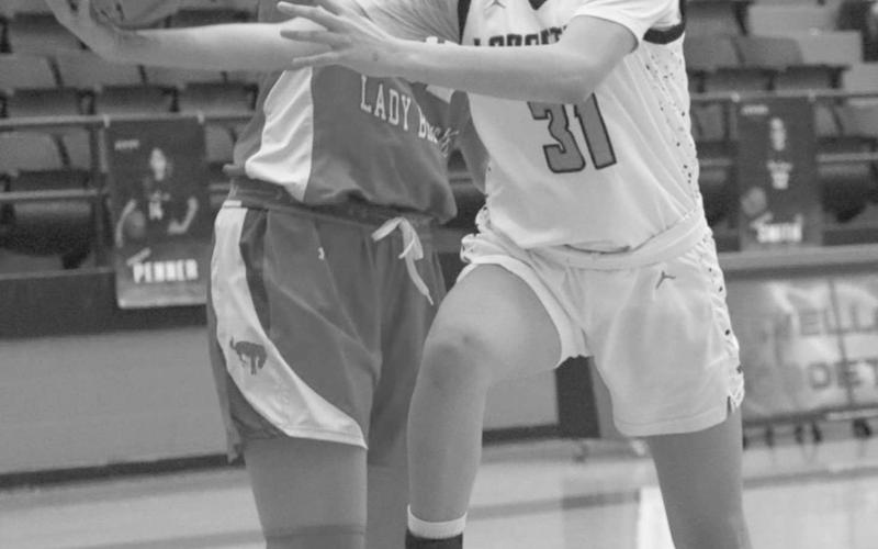 TOUGH SHOT - Levelland Loboette Leilani Sanchez layed the ball up through the contact during the team’s game against the Odessa Lady Broncos at home. (Staff photo by Aalijah Soliz)