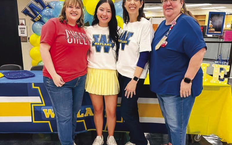 WAYLAND CHEER - LHS Senior Mackenzie Dominguez signed her letter of intent to cheer for Wayland Baptist University. The signing ceremony was held Thursday in the high school commons. Pictured with Dominguez are Coaches DeMerritt, Northcutt and Villanueva. (Photo courtesy of Cristal Isaacks)