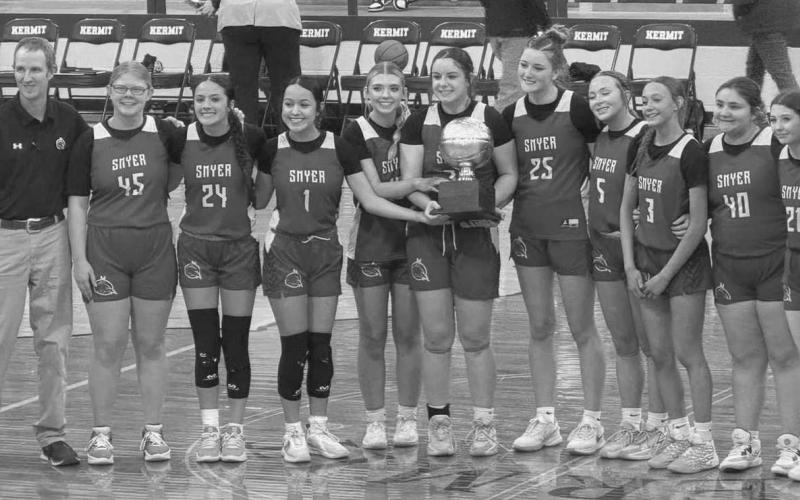 BI-DISTRICT CHAMPS - The Smyer Lady Cats beat the Van Horn Lady Eagles this past Monday night at Tahoka High School for their first round of playoffs win. Pictured above are Athletic Director Scott Funke, Coach Todd Nichols, Lynzie Benevedes, Jada Hernandez, Kira Posadas, Rylee Riedel, Khloe Morgan, Maegan Smith, Ellie Nelson, Kenzie Zapata, Tessa Perez and Kathryn Brown. (Photo courtesy of Smyer ISD)