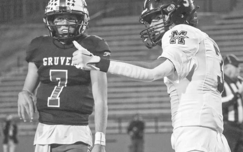ONE ON ONE - Morton Indian E.J. Rivas checked with the referee to make sure he was onsides as he lined up one on one against the Gruver cornerback. (Staff photo by Aalijah Soliz)