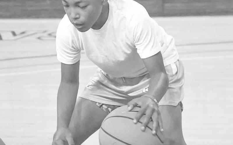 CROSSOVER - Levellands’ Bentley Sepulbeda worked on his crossover skills during the Levelland Basketball Camp that was held this past week. The Levelland ISD Basketball coaching staff worked with campers throughout three days in various sections split into different age categories. (Staff photo by Dom Puente)
