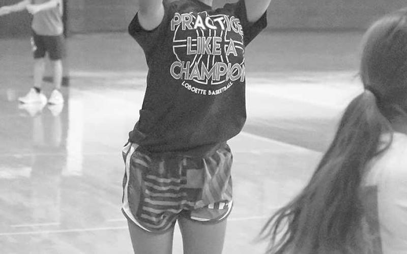 SHOOTER - Levellands’ Tatiyana Graves put up a jumper during a camp drill at South Plains College. The Levelland Basketball Camp was held in the SPC Dome this past week that spanned three days of instruction. (Staff photo by Dom Puente)