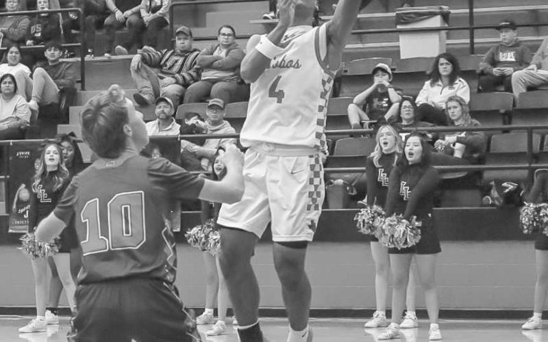 SLIPPERY FINISH - Levelland Lobo Bryson Golightly rose above the Sundown defense during the team’s last non-district game of the season. (Staff photo by Aalijah Soliz)