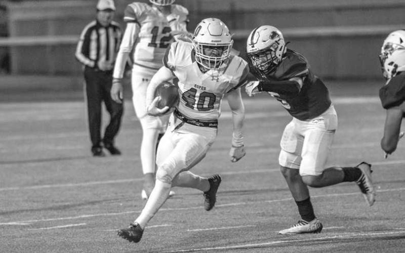 CANT CATCH ME - Ropes athlete Jacob Wyatt ran the ball during the Eagles playoff game against the Ralls Jackrabbits last Friday. (Photo courtesy of Donovan Martin)