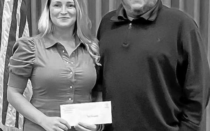 HOCKLEYCOUNTY ENDOWMENT DONATION - The Hockley County Endowment made several donations to various organizations this month to show their appreciation to the community. Pictured is Ryan Fitzgerald presenting a check to Devan Slaughter with Bill’s Backpacks. (Photo courtesy of Joey Pierce)