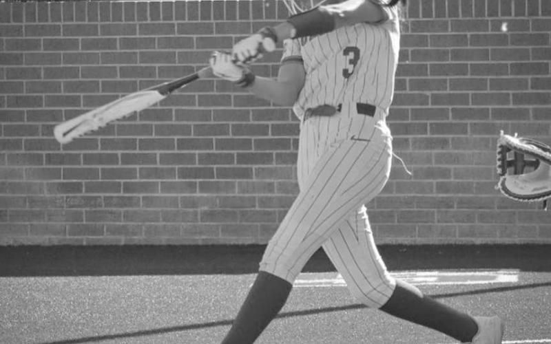 SWING - Sundown Roughette Destiny Garza swung at the pitch during the team’s blowout win against the Sunray Lady Cats in Plainvew. (Staff photo by Aalijah Soliz)