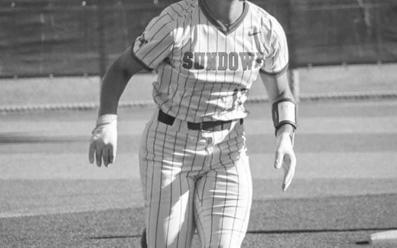 NO LOOKING BACK - Sundown Roughette Allie McCormick rounded third base during her team’s game against the Sunray Lady Cats last Saturday evening in Plainview. (Staff photo by Aalijah Soliz)