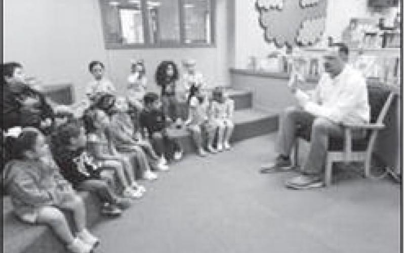 READING WITH HEROES-- LISD Superintendent Dr. Heseman kicked off the LABC Reading with Heroes Program last week. He read Pete the Cat Crayons Rock by Kimberly &amp;amp; James Dean to a class of PK students. The lesson in the book is that there are no mistakes in art, and art should come from the heart. If persons are interested in participating in the Reading with Heroes Program contact LABC. (Levelland ISD photo)