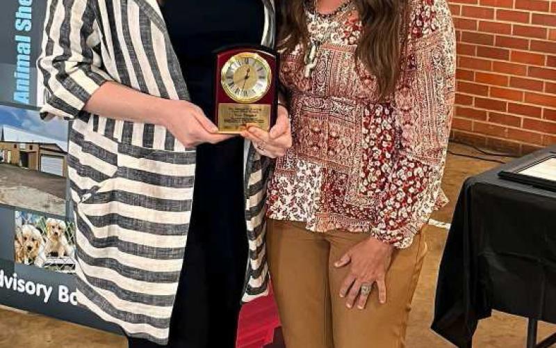 ACHIEVEMENTWINNER - The Levelland MainStreet Program gave multiple awards Wednesday at the Mallet Event Center. Pictured is MainStreet Director Tania Moody awarding Nicole Campbell with the George R. Keeling Achievement. (Submitted Photo)
