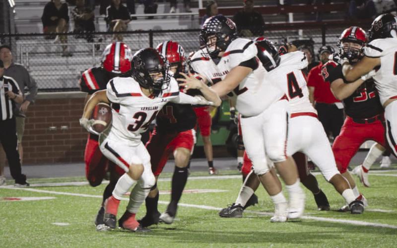 GREAT VISION - Levelland running back Ricky Rodriguez ran the ball during the Lobos game against the Borger Bulldogs. (Staff photo by Aalijah Soliz)