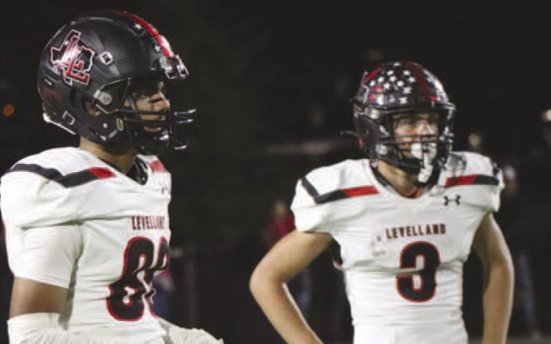REST - Levelland athletes Sean Landrum and Gage Potter were taking a breather during the teams game against the Borger Bulldogs. (Staff photo by Aalijah Soliz)