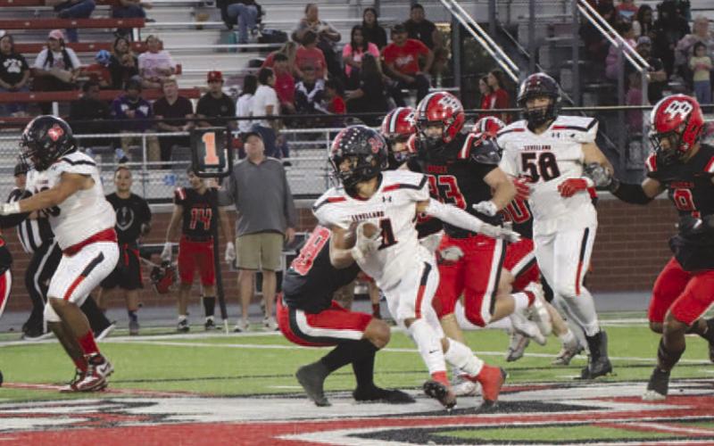 GREAT BLOCKING - Levelland running back Ricky Rodriguez ran up the middle for a big gain on the play. Levelland will play against Seminole this Friday at home at 7 p.m. (Staff photo by Aalijah Soliz)