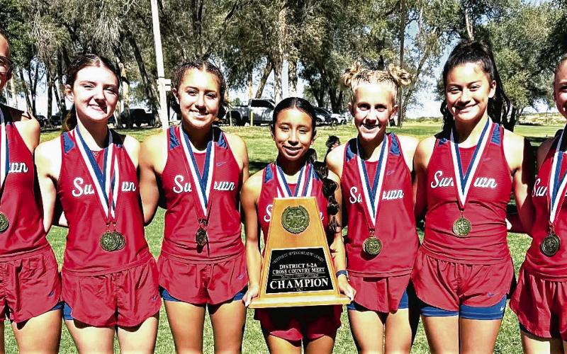 DISTRICT CHAMPIONS - The Sundown Roughettes Varsity Cross Country team won the District Championship this past Saturday at Yoakum Park in Denver City, Texas. Pictured in no particular order is Addie Hord, Kaylin Clausen, Karter Hord, Ivy McGlasson, Sarah Posadas, Karmindy Townsend and Maddy Medrano. (Photo provided by Sundown Roughnecks Facebook Page)